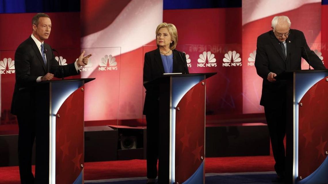 Democratic presidential candidates Martin O'Malley, Hillary Clinton, and Bernie Sanders at the Democratic presidential candidate debate in Charleston, S.C., on Sunday.