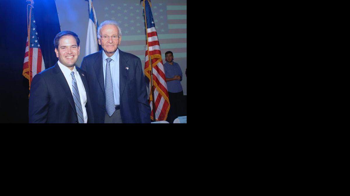 Billionaire Norman Braman, right, and Sen. Marco Rubio are pictured at a 2012 Greater Miami Jewish Federation bipartisan rally for Israel solidarity.