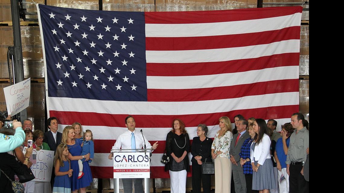 
Florida Lt. Gov. Carlos Lopez-Cantera announces his bid for Marco Rubio’s U.S. Senate seat Wednesday, surrounded by family and friends at a loading dock for a containers manufacturing and wholesale company north of Doral.
