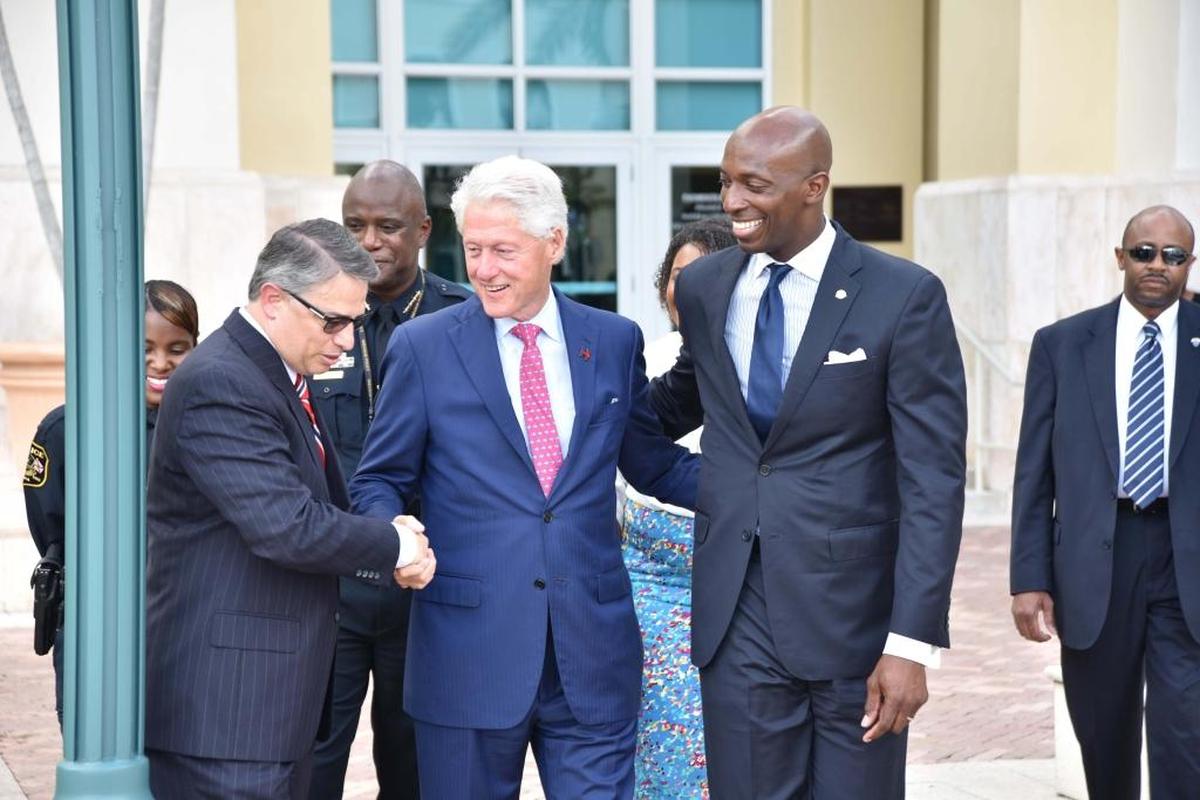 Miaramar Mayor Wayne Messam gives former President Bill Clinton a tour of the Miramar City Hall Plaza in 2016.