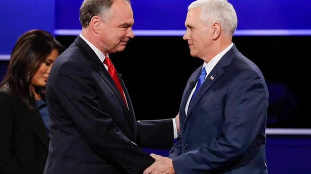 Republican vice presidential nominee Gov. Mike Pence, right, and Democratic vice-presidential nominee Sen. Tim Kaine shake hands during the vice-presidential debate at Longwood University in Farmville, Va., Tuesday, Oct. 4, 2016.