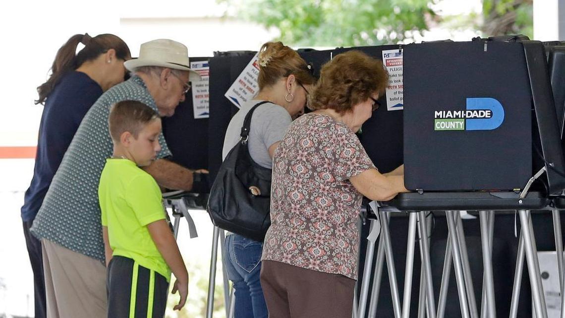 In this file photo, voters fill out their ballots during Florida’s Aug. 30 primary.