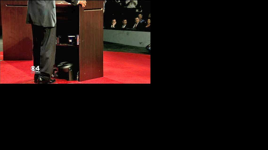 
Charlie Crist uses an electric fan under his lectern during a gubernatorial debate against Gov. Rick Scott.
