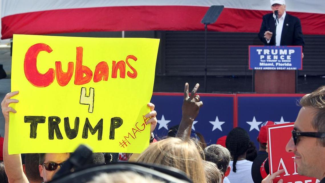 A man holds a sign that reads “Cubans 4 Trump” during a Donald Trump campaign rally at Bayfront Park Amphitheater in Miami on Nov. 2.