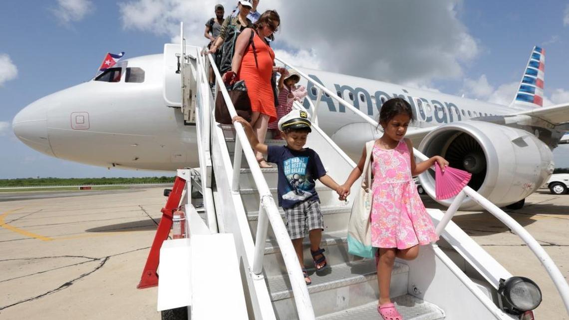 Passengers arrive in Cienfuegos, Cuba, on American Airlines’ inaugural scheduled service from Miami to Cuba on Sept. 7.