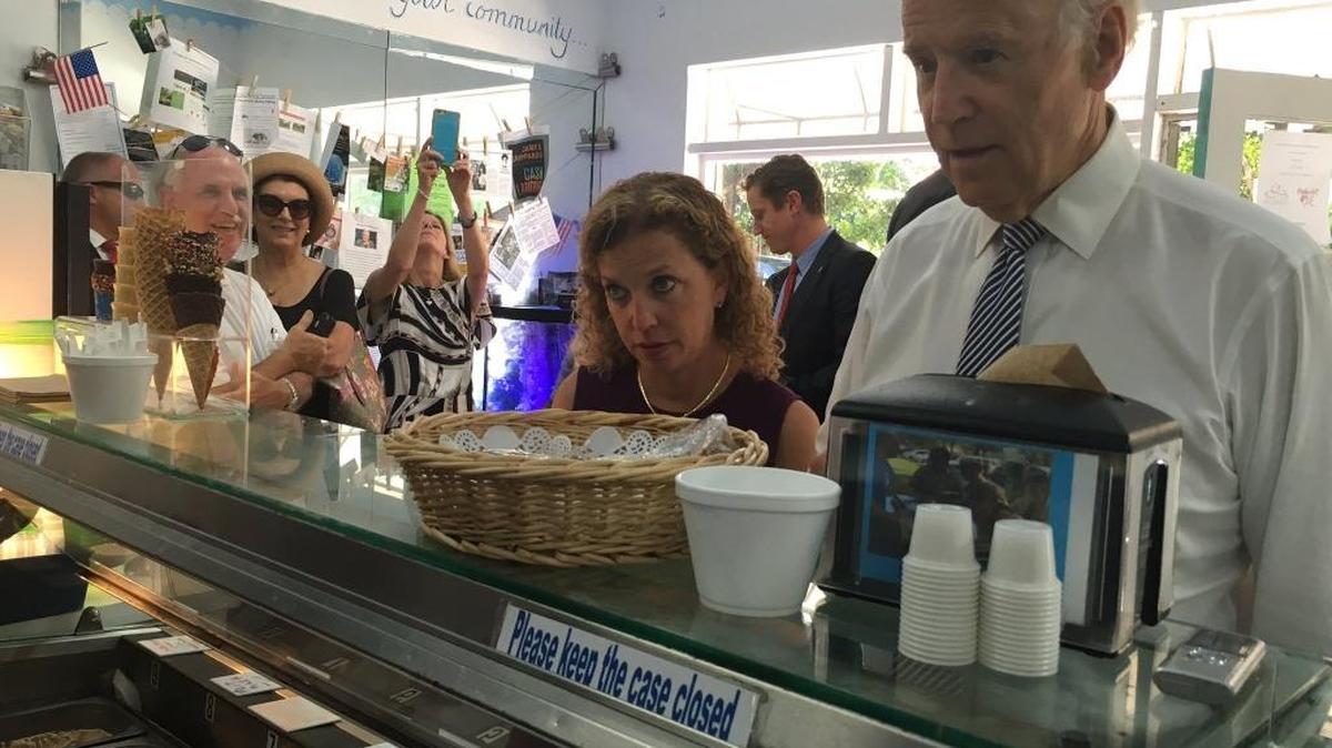Vice President Joe Biden and U.S. Rep. Debbie Wasserman Schultz work the crowd at South Miami Whip ’N Dip on Friday. He ordered white chocolate chip. She ordered Snickers.