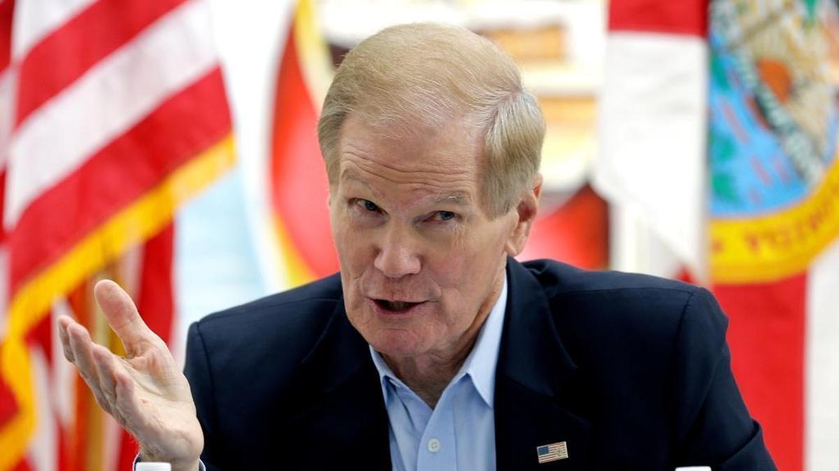 In this Aug. 25, 2017, file photo, Sen. Bill Nelson, D-Fla., talks to a group of Haitian community leaders in the Little Haiti area in Miami.