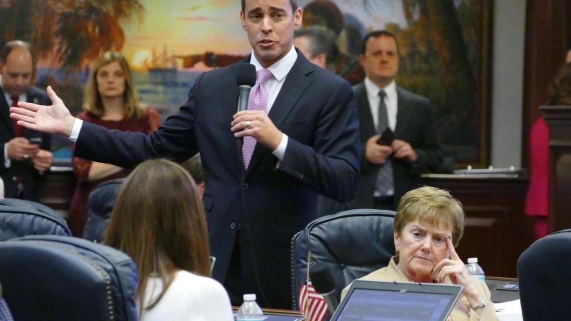 Rep. Erik Fresen, R- Miami, answers questions about the education bill (HB 7029) in the Florida House on Thursday. On the right is Rep. Marlene O’Toole, R-The Villages.