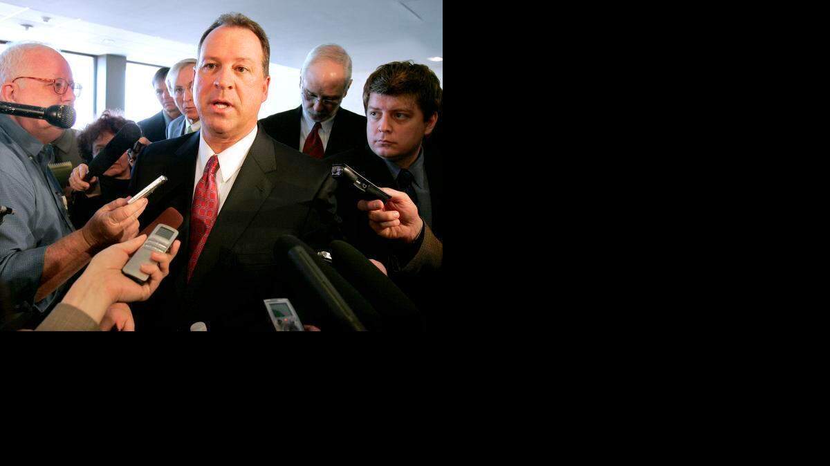 
A one-day trial is underway to decide whether taxpayers should pay the legal fees owed by former Florida House Speaker Ray Sansom. Sansom wants the state to pay nearly $1 million owed to the lawyers who successfully defended him against a 2009 indictment. In this file photo, Sansom, R-Destin, center, talks with reporters following a speech in Tallahassee in 2009.

