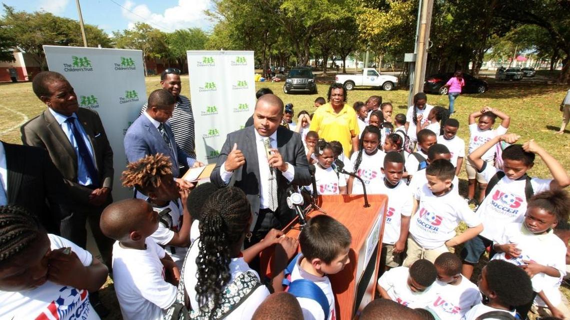 Miami City Commisioner Keon Hardemon (center) speaks during an event by the Children's Trust and U.S. Soccer Foundation to announce a partnership to bring the game of soccer to hundreds of children in Miami at Hadley Park in Liberty City on Wednesday, May 17, 2017.