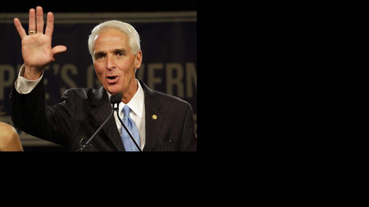 
Florida Democratic gubernatorial candidate Charlie Crist waves to the crowd of supporters after delivering his concession speech Tuesday, Nov. 4, 2014 in Tampa.

