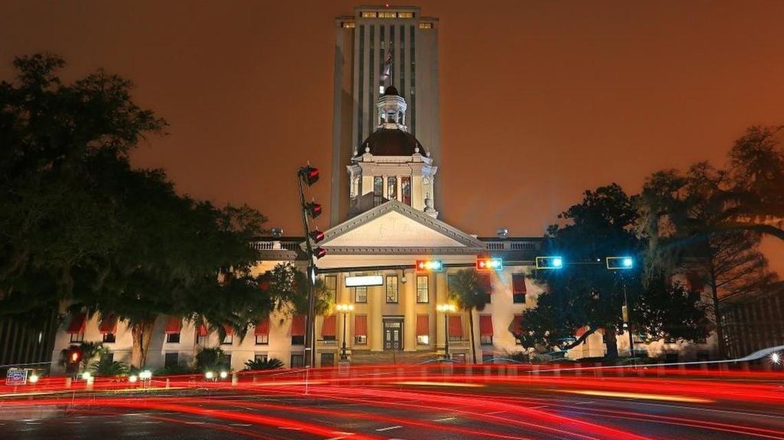 
Traffic blurs by Florida's historic Old Capitol building in Tallahassee. Florida lawmakers will reconvene their special session Monday to continue considering new boundaries of congressional districts for the third time. 
