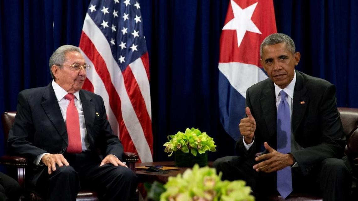 President Barack Obama and Cuban President Raul Castro sit together for members of the media before a bilateral meeting, Tuesday, Sept. 29, 2015, at the United Nations headquarters.