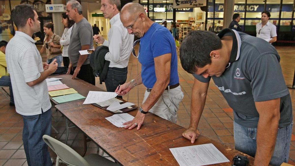 Property owners line up at the office of the Miami-Dade County property tax appraiser to appeal tax increases in 2010.