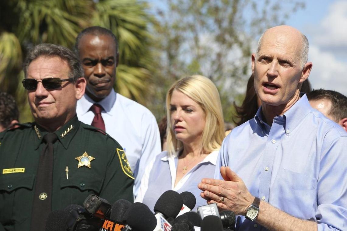 Florida Gov. Rick Scott on Feb. 15 speaks about the mass shooting the day before at Marjory Stoneman Douglas High School in Parkland. Seventeen students and faculty members were killed.