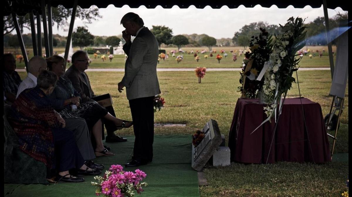 Glen Varnadoe, the nephew of Thomas Varnadoe, is overcome with emotion at Thomas Varnadoe’s burial in Plant City on Nov. 24, 2014. Thomas Varnadoe died at the Florida School for Boys in 1934, and his family fought for decades to have the remains returned so that he could be buried properly. His remains were identified by a team of researchers from USF who exhumed a cemetery at the school in the Florida Panhandle.