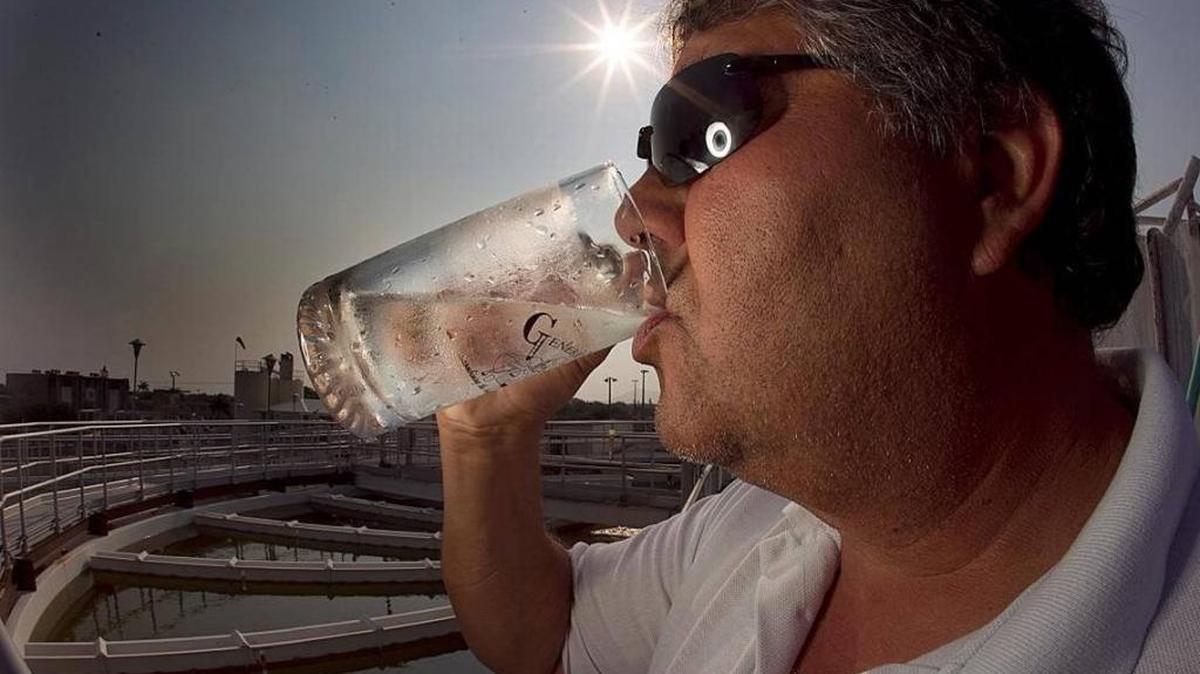 Michael Ponce samples water at a Pembroke Pines treatment facility in 2011.