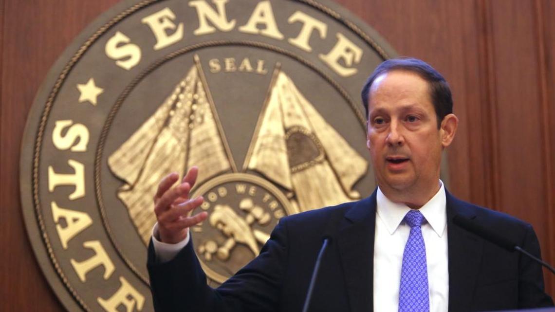 Florida Senate President Joe Negron talk to members in the chamber on Wednesday, March 8, 2017.