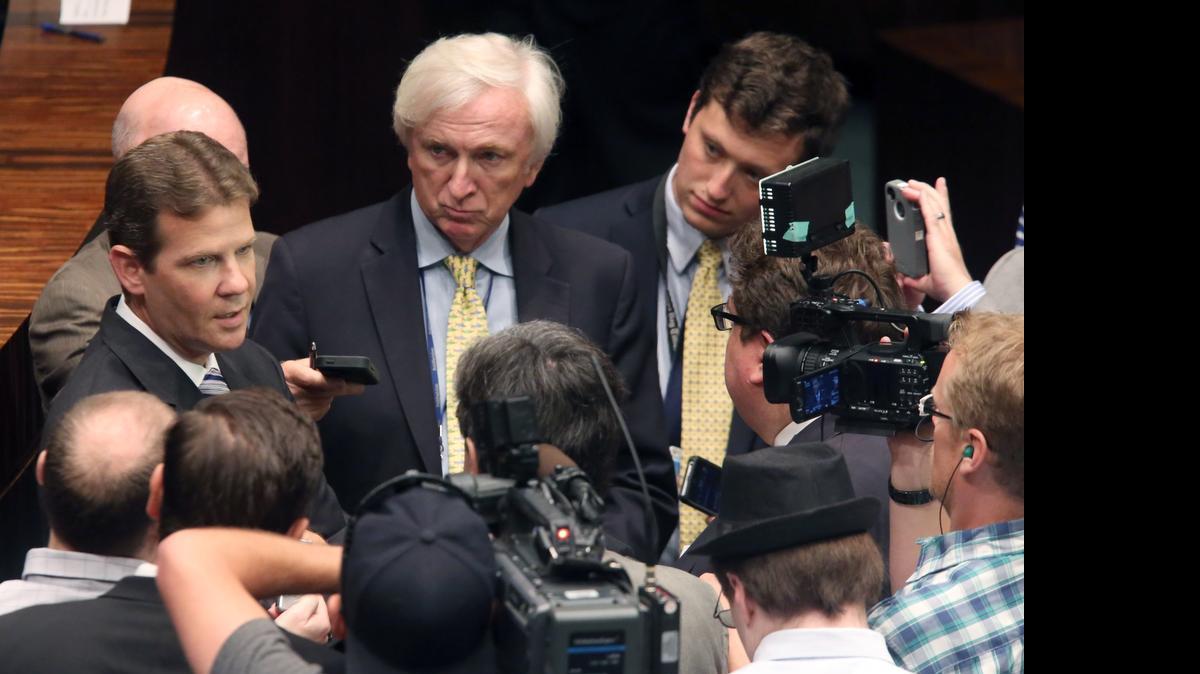 Senate president Andy Gardiner, R-Orlando, left, talks with the press after session, Monday, June 1, 2015, in Tallahassee. Florida legislators are starting a 20-day special session where they are expected to pass a new state budget.
