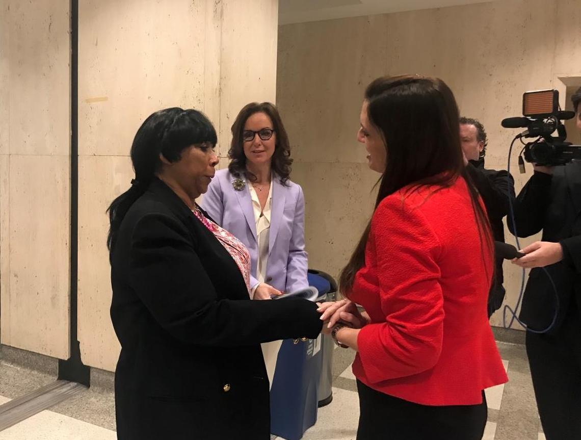 After she watched the House vote to send the legislation to the governor, advocate Sherry Johnson thanked bill sponsors Sen. Lizbeth Benacquisto, R-Fort Myers, center, and Rep. Jeanette Nuñez, R-Miami, outside the chamber doors.