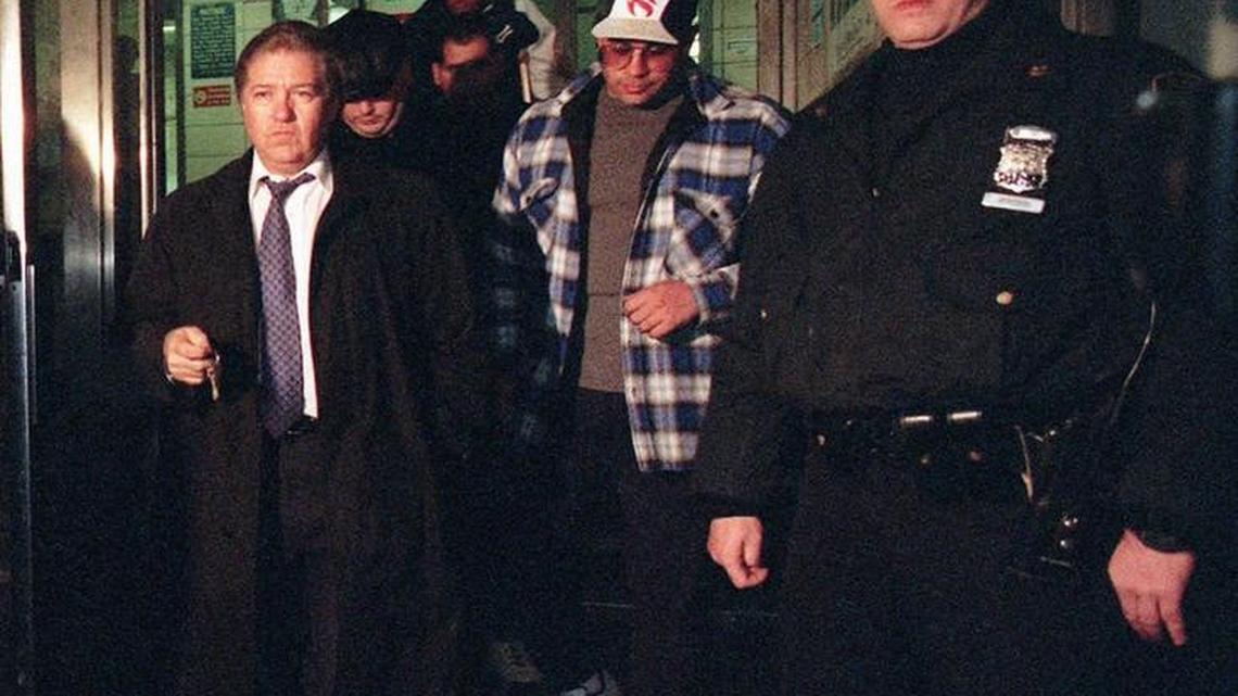 John Gotti Jr., center, leaves the 60th Precinct in New York’s Brooklyn borough early April 11, 1997, after he was arrested and charged with obstructing justice. Gotti, son of the former mob boss, was arrested after he and two men interfered with an undercover drug operation in Brooklyn, a police spokesman said.