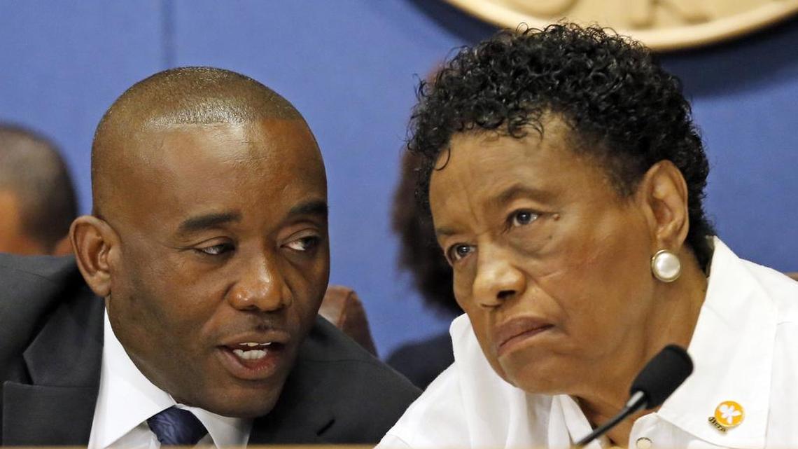 It’s OK for two elected officials, such as Miami-Dade County commissioners Jean Monestime, left, and Barbara J. Jordan to confer during public debate, but under Florida law they can’t discuss public business outside of public meetings. The Florida Legislature is considering a proposal to change that.