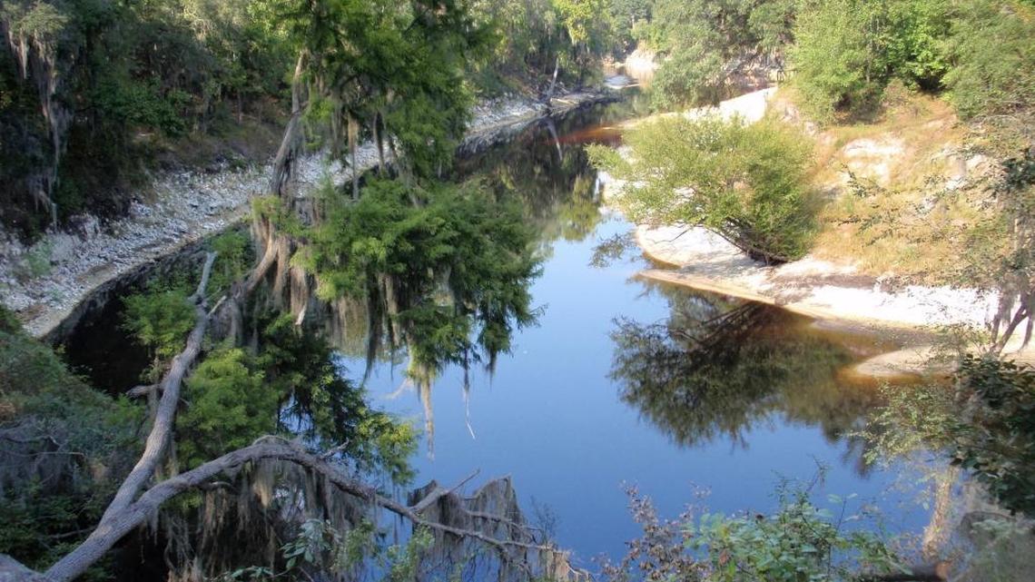 A Florida manhunt took an odd turn when a man jumped into the Suwannee River, lost his pants and continued his escape while naked, the Suwannee County Sheriff’s Office said.
