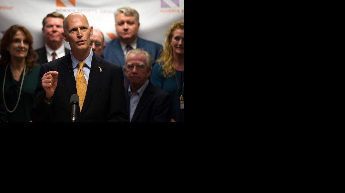 
Florida Gov. Rick Scott speaks at a news conference at Norris Sports Group on Friday, March 27, 2015, in Naples, Fla. Florida's unemployment rate is dropping slightly. New numbers released Friday show that the state's unemployment rate for February was 5.6 percent. That's a drop of 0.1 percent from January. Scott announced the new jobs numbers during his visit to the sports marketing company. 
