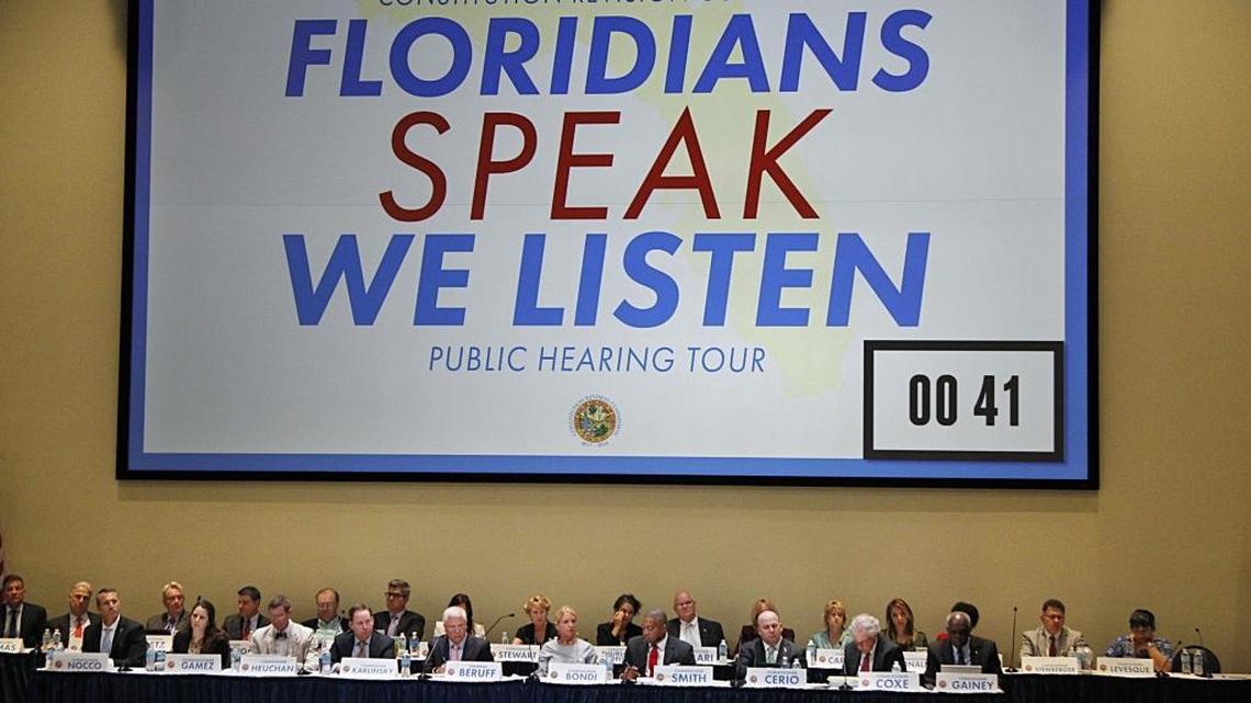 Members of the Constitutional Revision Commission listen to residents during a town hall meeting at Florida International University in Miami, April 6, 2017.