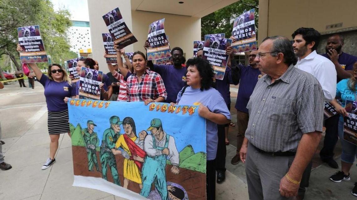Protesters gather at the Miami-Dade government center on Jan. 27, 2017, to protest against Miami-Dade Mayor Carlos Gimenez’s decision to remove the county’s label as a “sanctuary” for undocumented immigrants in the country illegally.