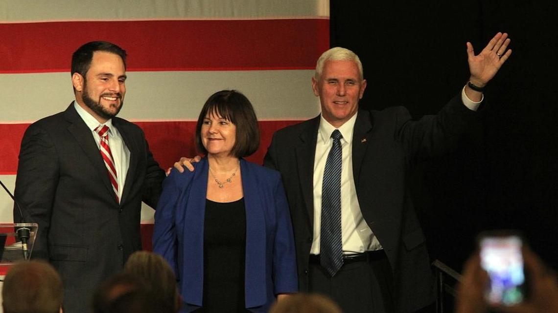 Miami state Rep. Carlos Trujillo, left, introduced then-vice presidential nominee Mike Pence and his wife, Karen, at the Miami-Dade Republican Party’s 2016 Lincoln Day dinner.