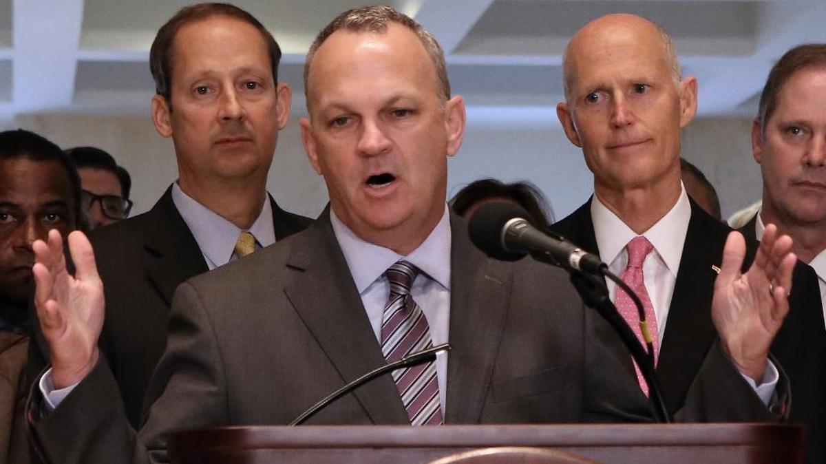 House Speaker Richard Corcoran, R-Land O’Lakes, addresses legislators and media at the end of the special session as Senate President Joe Negron, R-Stuart, left, and Gov. Rick Scott look on, Friday, June 9, 2017, in Tallahassee.