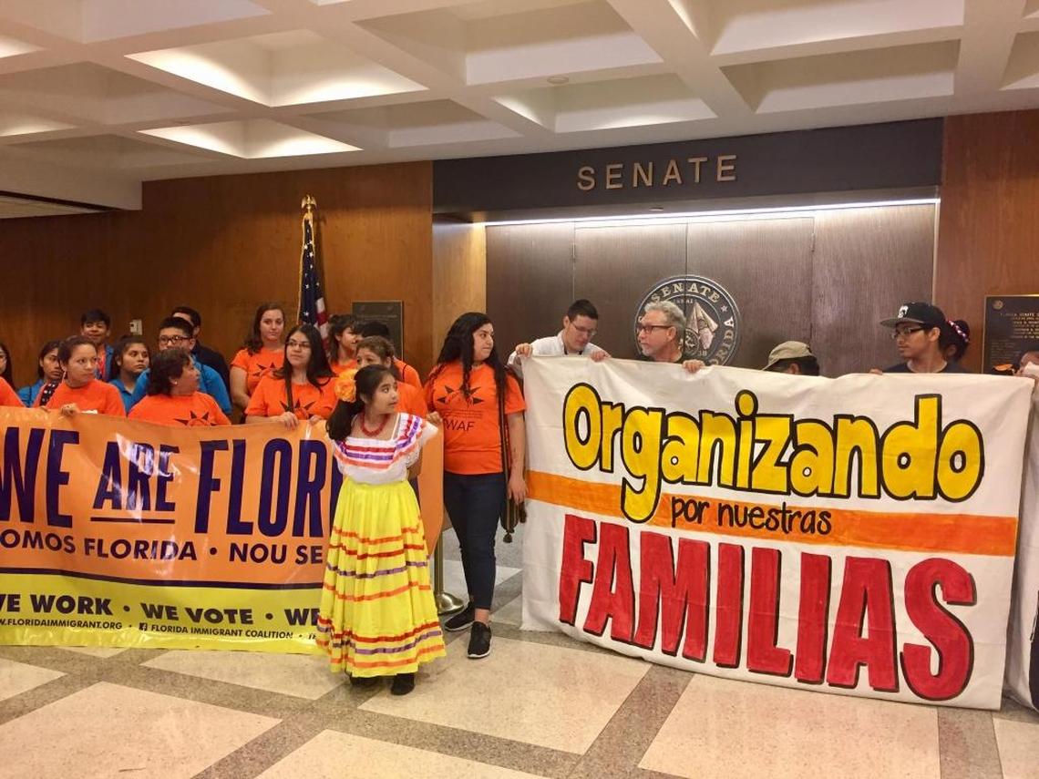 Dozens of immigrant advocates gathered at the Florida Capitol in March to oppose anti-immigrant bills lawmakers are considering this spring.
