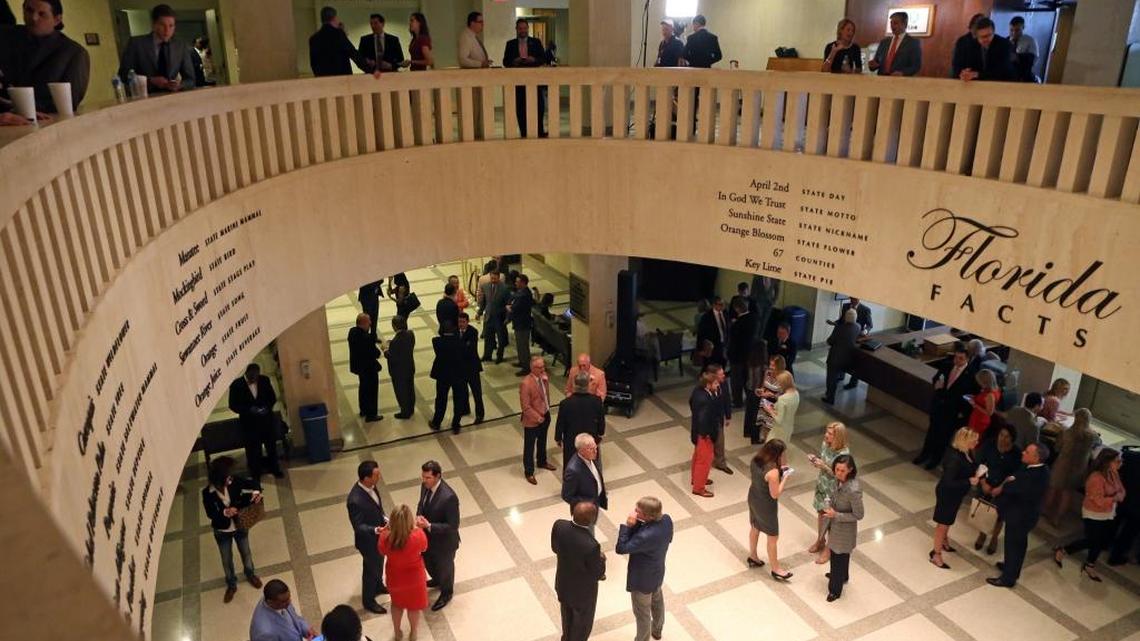 Lawmakers return to the Capitol on Monday for one day of overtime where they’re expected to debate and pass an $82.4 billion state budget and a series of sweeping policy bills negotiated in secret and disclosed publicly last week. In this file photo, lobbyists gather in the hallways.