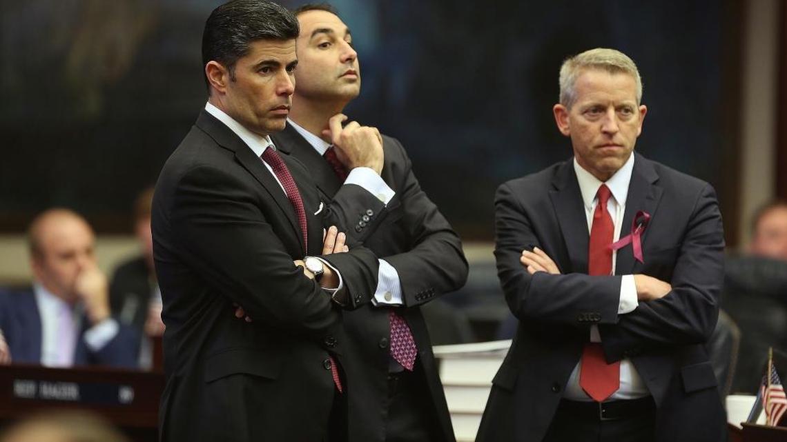 From left, Rep. Jose Oliva, R-Miami Lakes, Rep. Mike La Rosa, R-St. Cloud, and Rep. Paul Renner, R-Palm Coast, listen to debate on Democrats’ proposed amendments to a gun and school safety bill, Tuesday, March 6, 2018, in the Florida House in Tallahassee.