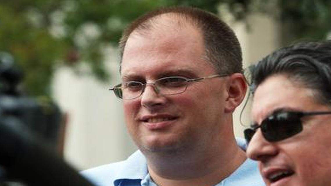 
Justin Lamar Sternad, center, stands by as his attorney Enrique Yabor, right, and answers questions after the sentencing Friday, Sept. 19, 2014, in federal court in Miami.

