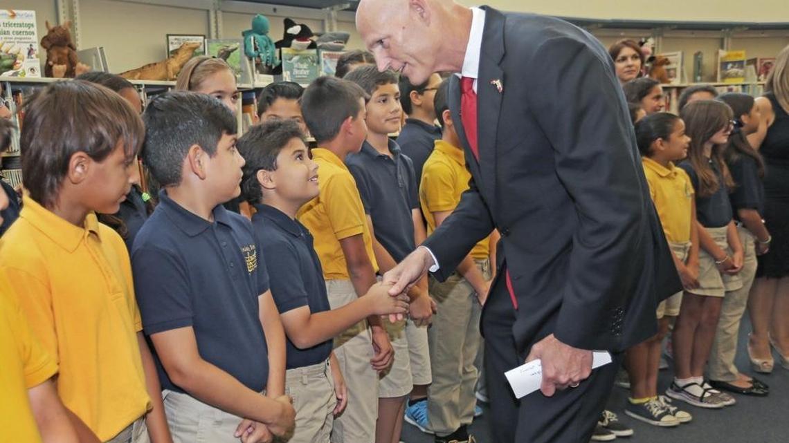 
Florida Gov. Rick Scott greets students from a 4th grade class at Dr. Carlos J. Finlay Elementary School on Monday, June 1, 2015.
