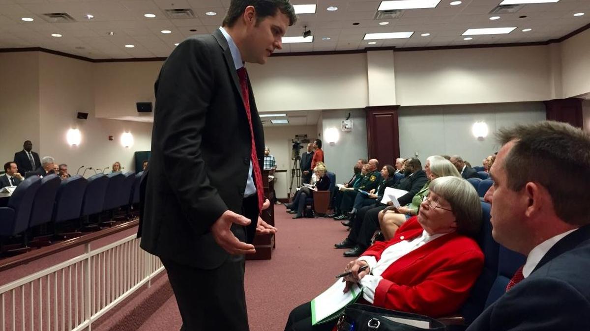 State Rep. Matt Gaetz, R-Fort Walton Beach, left, confers with gun-rights lobbyists — Marion Hammer, the National Rifle Association’s longtime Tallahassee representative, and Florida Carry’s attorney Eric Friday — about a late-filed amendment proposed to Gaetz’s open-carry gun legislation on Thursday, Jan. 28, 2016, during a meeting of the House Judiciary Committee.