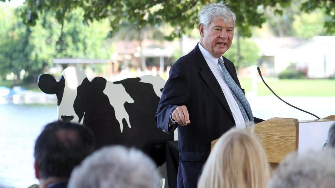 Former U.S. Senator Bob Graham speaks during the 80th anniversary celebration for the Graham Companies and the 50th anniversary celebration for the city of Miami Lakes in front of Lake Patricia, Aug. 30, 2012.