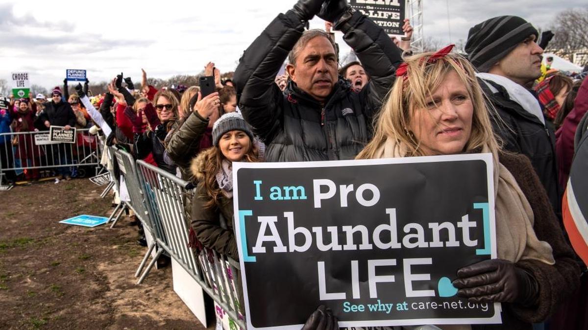 Mary Kolar, 58, from Tequesta, listens to Vice President Mike Pence as thousands of pro-life marchers crowd the streets near the National Mall during the March for Life on Jan. 27, 2017, in Washington, D.C.