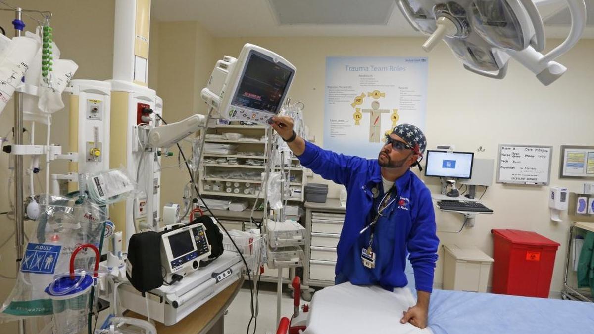 Trauma nurse Luis DeRosa checks on systems in one of the new trauma units at Jackson South Community Hospital in 2016. Jackson South’s trauma center is part of the compromise deal reached by the Legislature.