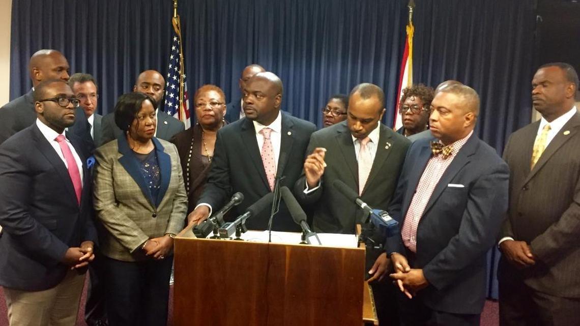 Members of the Florida Legislative Black Caucus speak at a press conference Wednesday at the Florida Capitol, calling on Gov. Rick Scott to launch an independent investigation into the police-involved shooting death of Corey Jones in Palm Beach County.