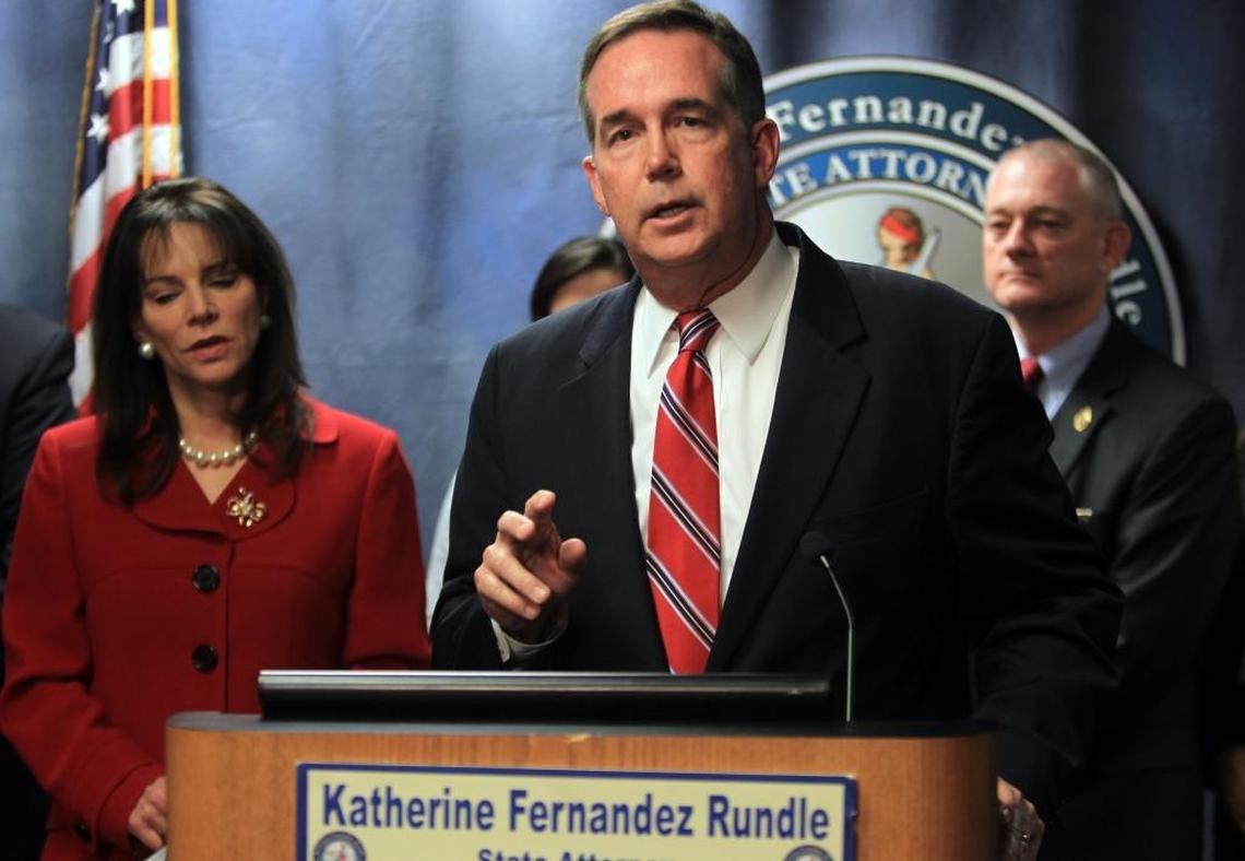 Florida CFO Jeff Atwater speaks during a news conference, Feb. 4, 2014 in Miami, where Miami-Dade State Attorney Katherine Fernandez Rundle announced that 22 people had been charged in a major home insurance fraud ring operating in South Florida.