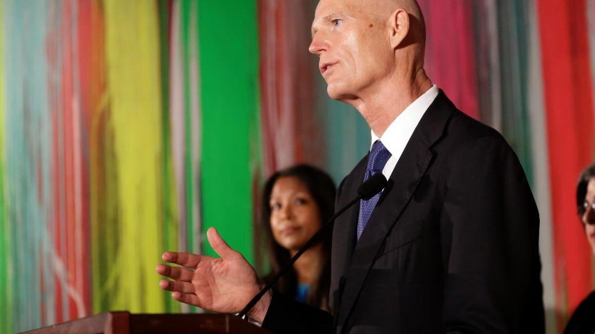 Florida Gov. Rick Scott, shown here at a Miami press conference in September, mistakenly wished Jewish Floridians a “Happy Yom Kippur,” although it is solemn holiday meant for atonement.