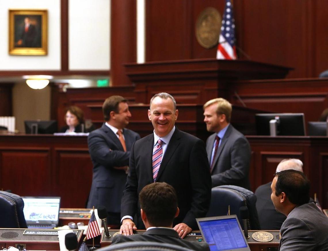 Florida House Speaker Richard Corcoran, R- Land O’Lakes, center, was all smiles on the House floor on May 5, 2017, after budget negotiations ended.