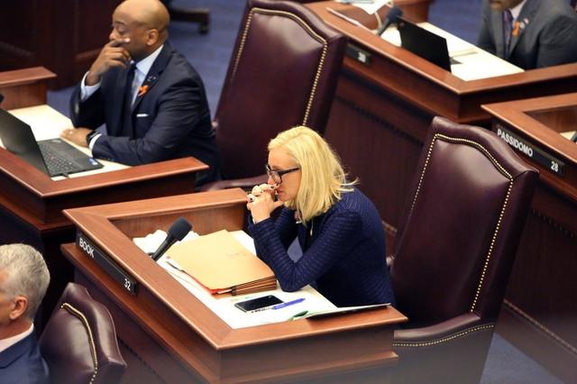 Sen. Lauren Book gets emotional on the floor of the Senate on Wednesday morning, Feb. 21, 2018, after photos of each of the 17 victims of the shooting at Marjory Stoneman Douglas High School were shown on a screen overhead.