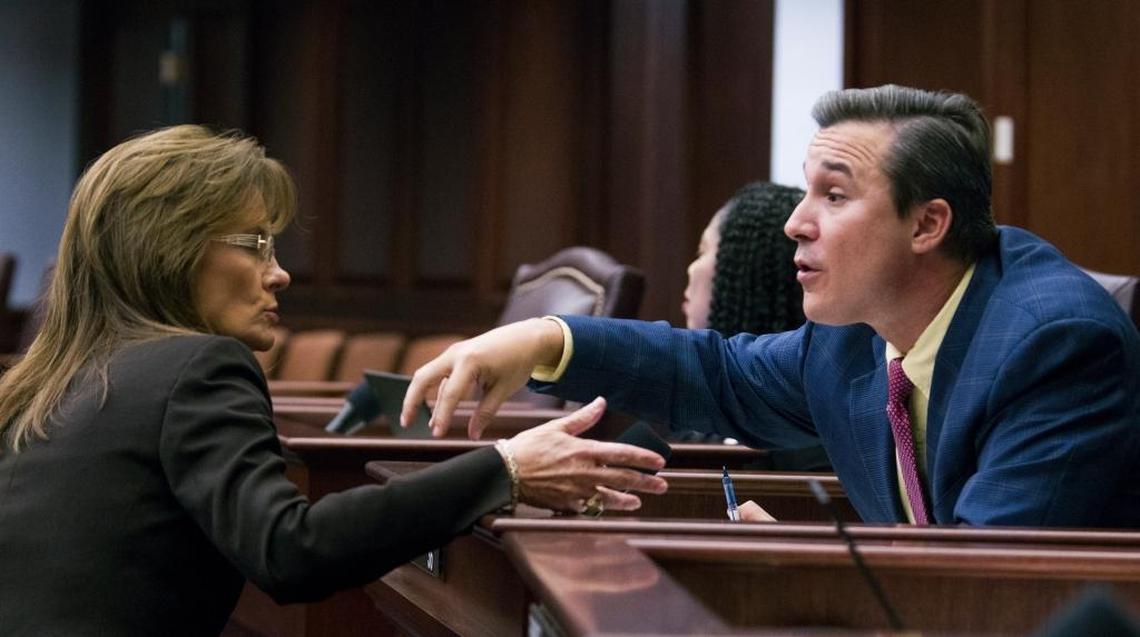Sen. Rene Garcia, right, R-Hialeah, and Sen. Denise Grimsley, R-Lake Placid, talk during an education budget discussion on the floor of the Senate Mon., May 8, 2017, at the Florida Capitol in Tallahassee.