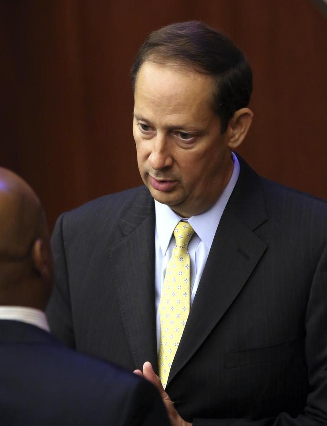 Senate President Joe Negron, R-Stuart, confers with minority leader Sen. Oscar Braynon, D-Miami Gardens, before the start of session, Friday, June 9, 2017, in Tallahassee.