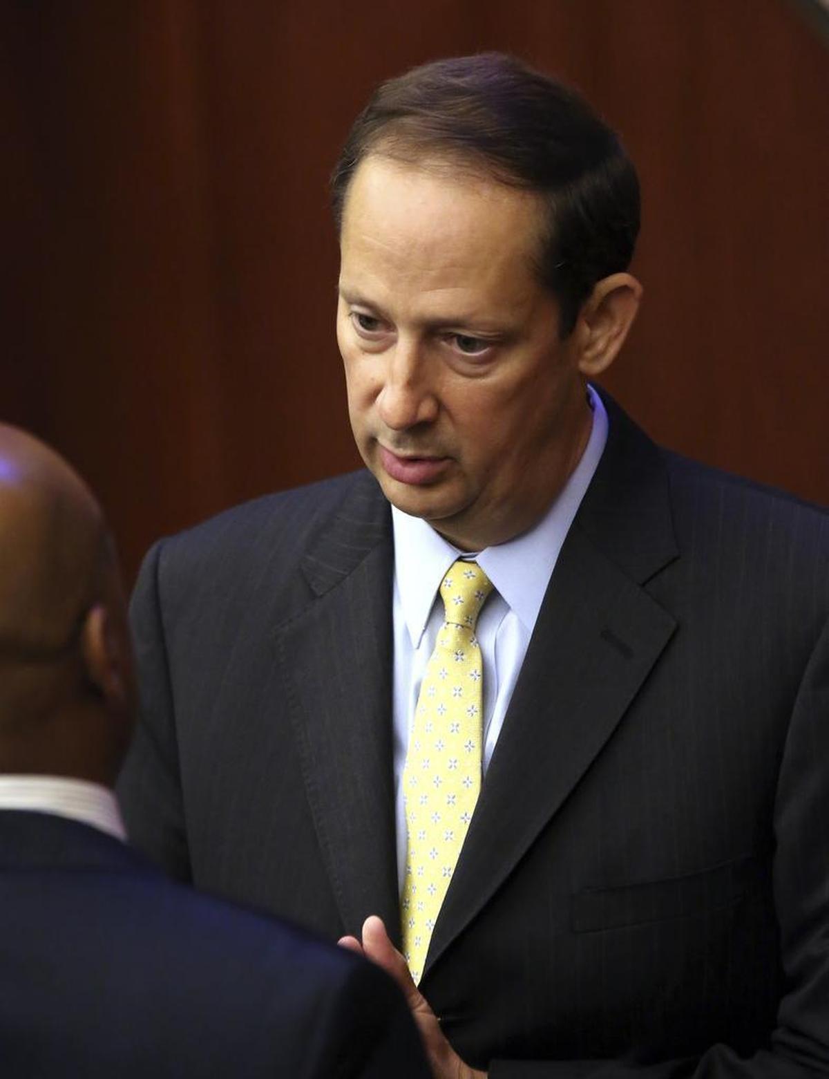 Senate President Joe Negron, R-Stuart, confers with minority leader Sen. Oscar Braynon, D-Miami Gardens, before the start of session, Friday, June 9, 2017, in Tallahassee.