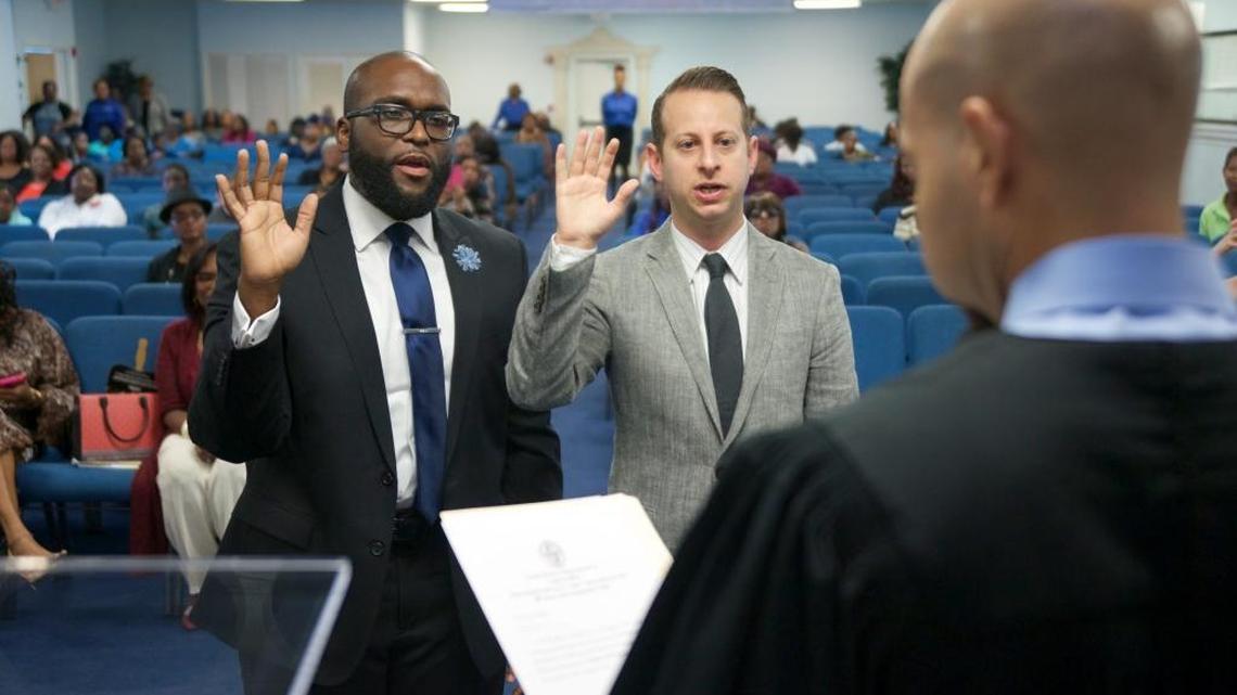 Broward County Judge Kal Evans administers the oath of office to newly reelected Democratic state Reps. Shevrin Jones, left, of West Park, and Jared Moskowitz, of Coral Springs, on Sunday, Nov. 20, 2016. Jones and Moskowitz received excused absences from the Legislature’s organizational session in Tallahassee on Tuesday.